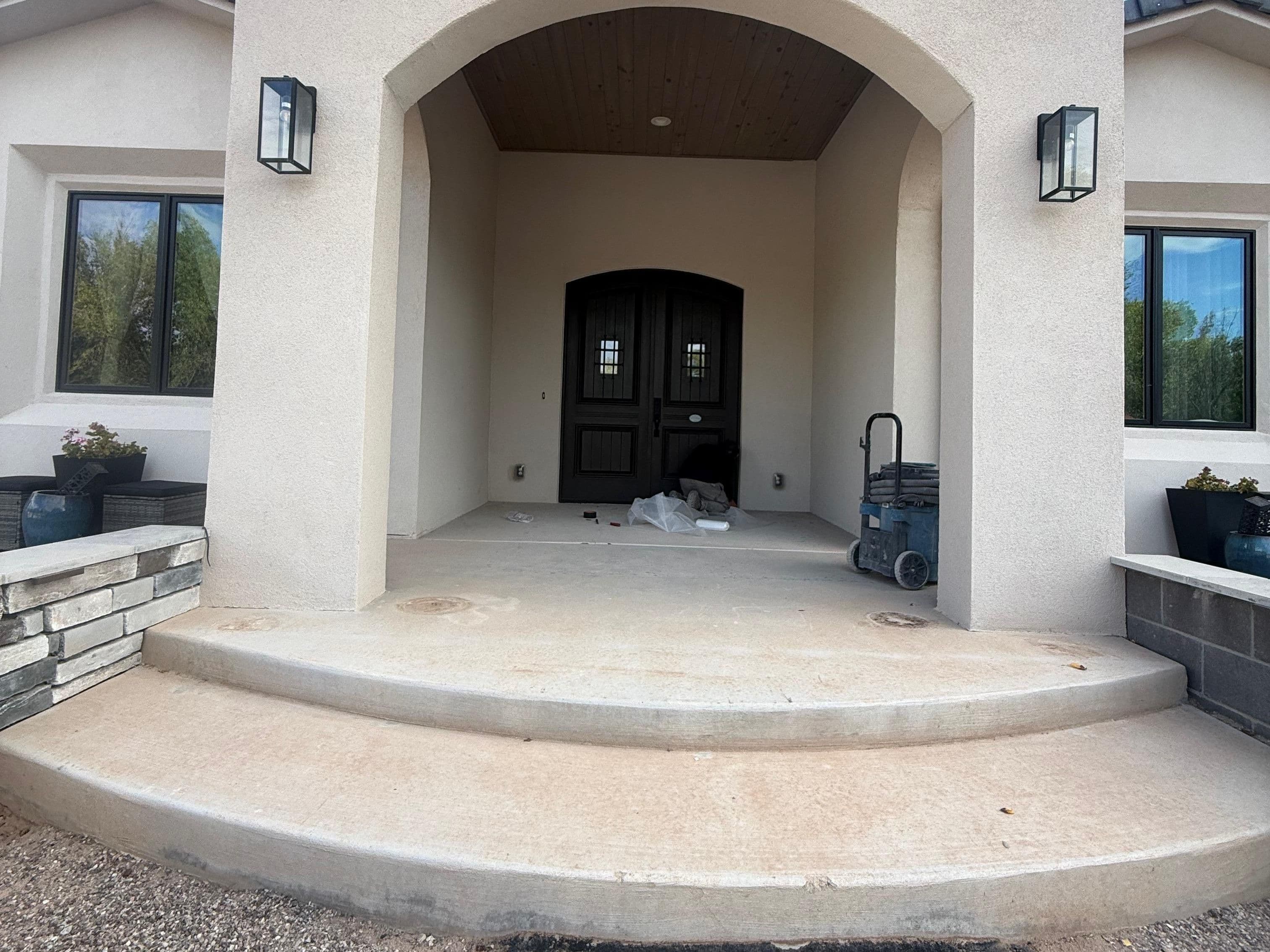 Two-Tone Resin Rock Front Porch in Corrales, NM - Before (Patio & Porch)